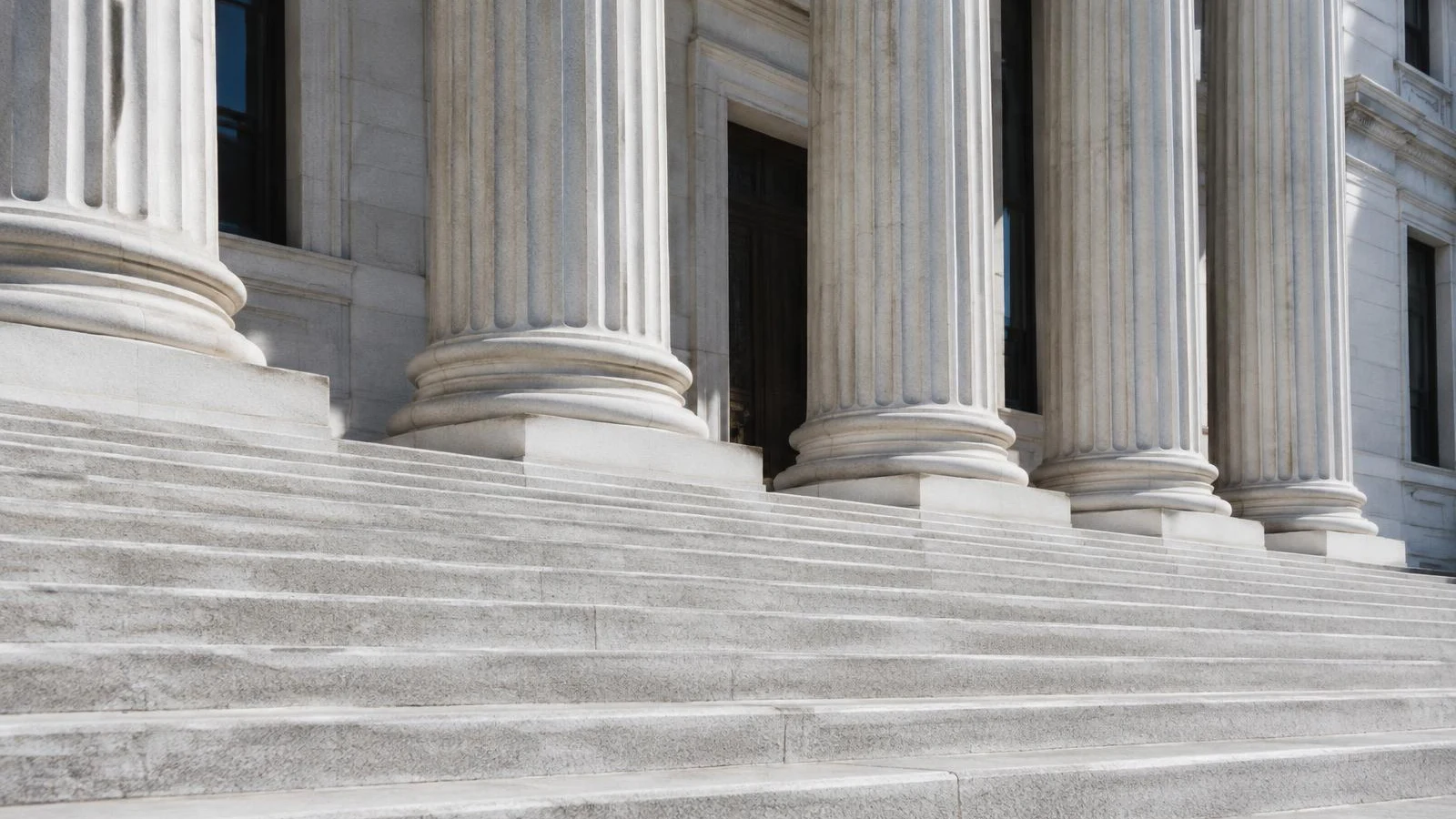 Stone steps and columns of a courthouse